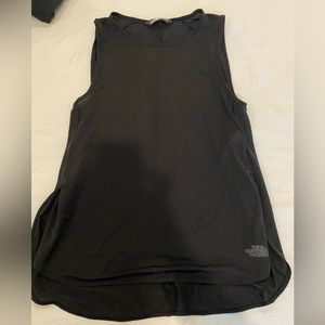 North face workout tank very thin material perfect for running and working out.